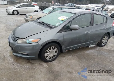 2010 Honda Insight Lx z USA, uszkodzony, nr VIN JHMZE2H57AS028046